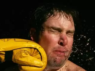 fist hitting face